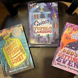 Set of 3, hardcover books by Sheila Turnage,